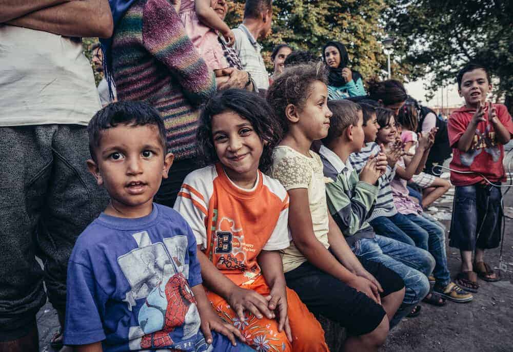 Children in a makeshift refugee camp in one of the parks in Belgrade. Photo: Shutterstock